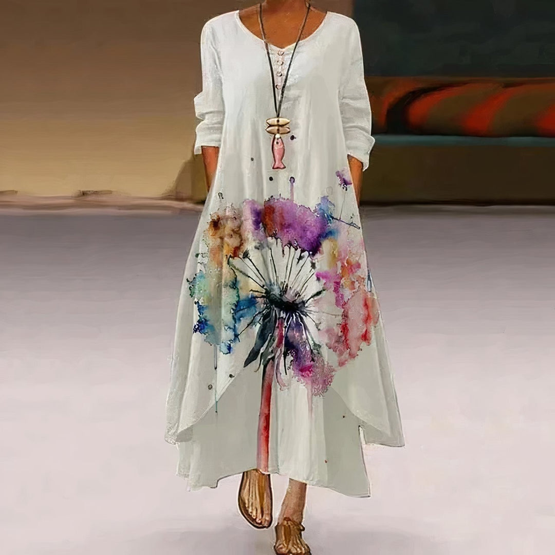 white maxi dress with watercolor dandelion print and long sleeves