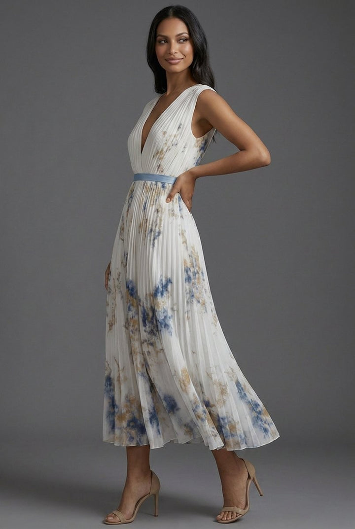 Side view of ivory pleated midi dress with watercolor floral print