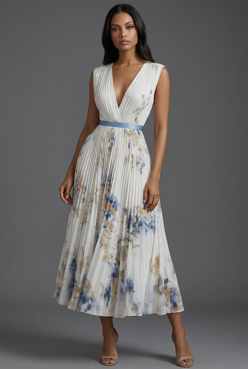 Front pose in cream pleated V-neck midi dress with floral accents