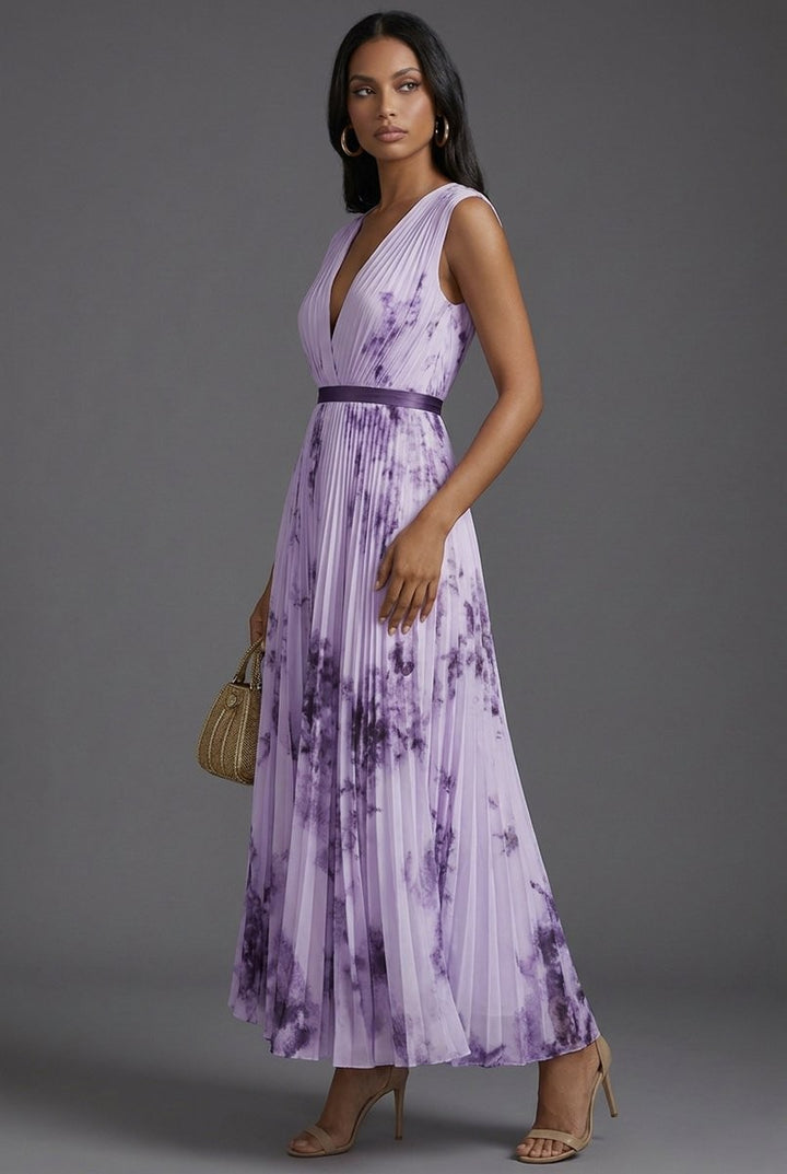 Side angle of purple floral pleated midi dress with satin belt