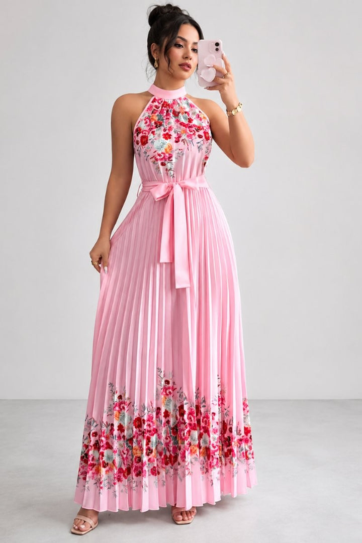 Pink floral halter maxi dress with pleated skirt and waist tie