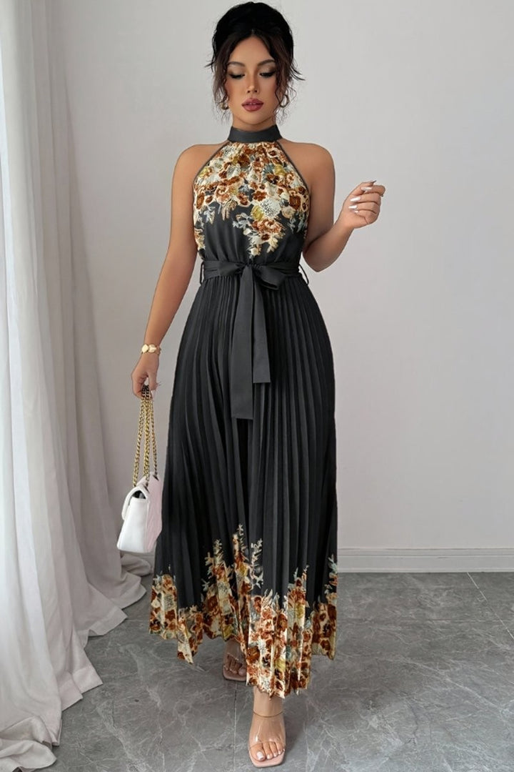 Charcoal floral halter dress with pleated skirt and tie belt
