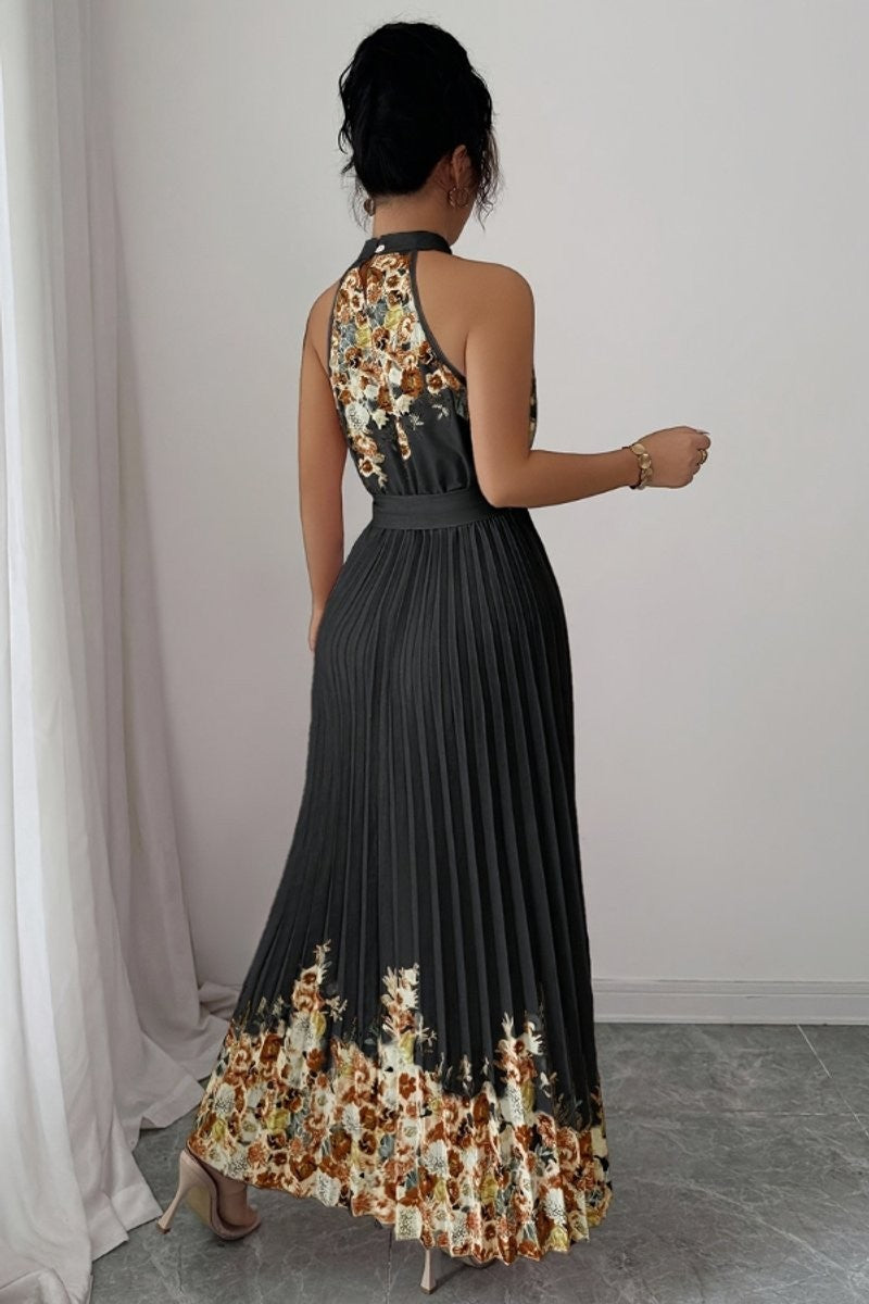 Back view of charcoal pleated maxi dress with floral hem print