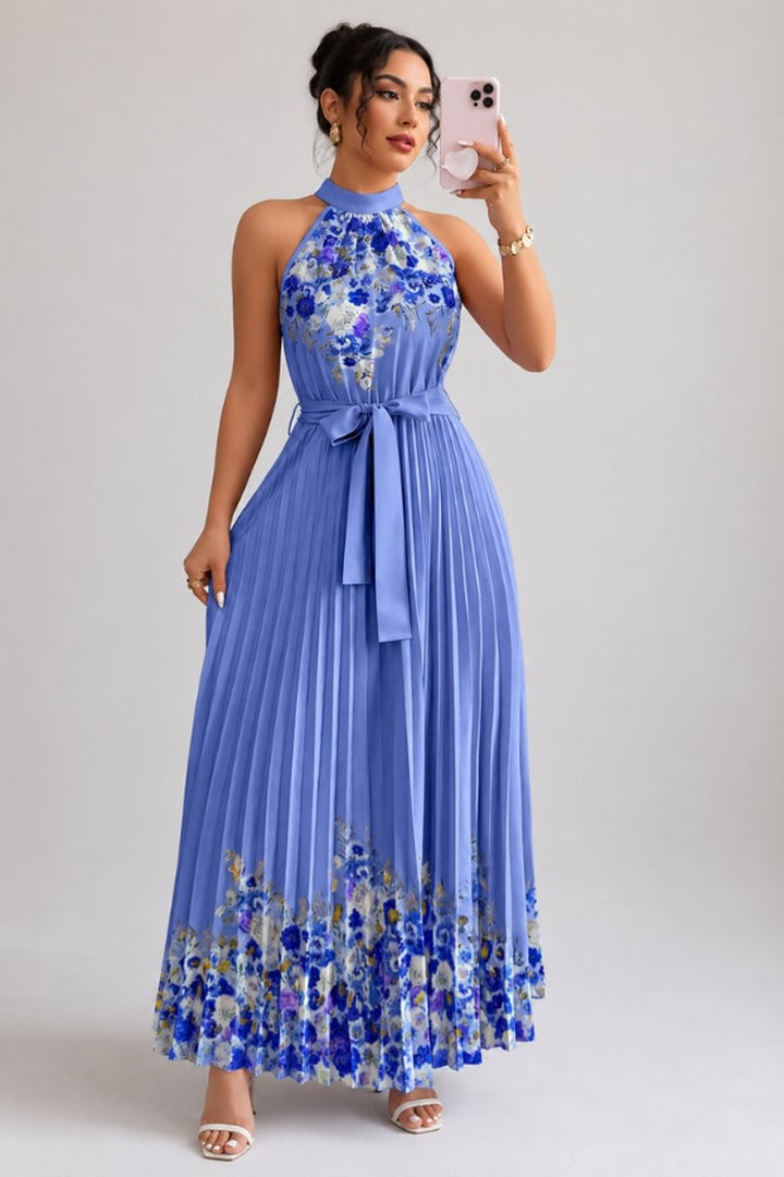 Periwinkle blue floral pleated dress with halter collar and tie belt