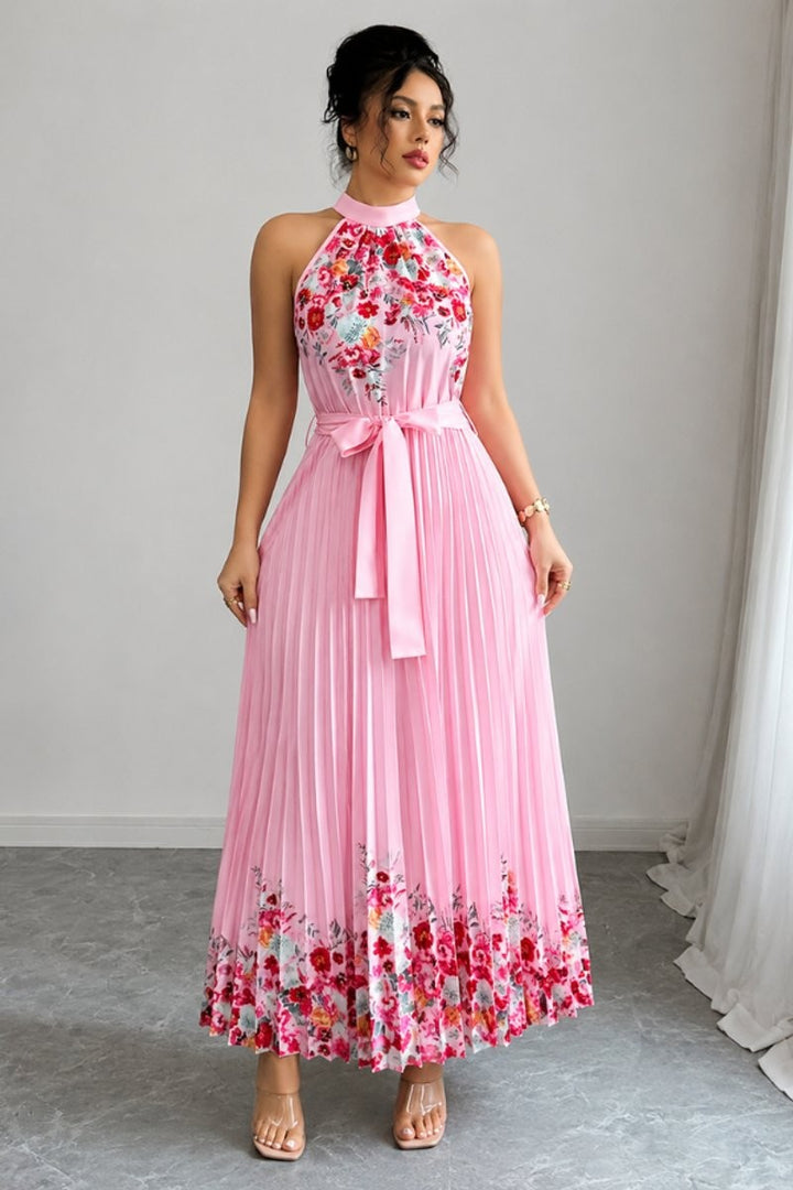 Halter neck pink floral maxi dress featuring pleated flowing skirt