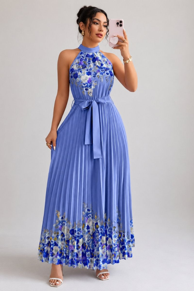 Periwinkle blue floral halter dress with pleated maxi silhouette