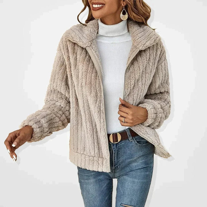 beige fuzzy zip-up teddy cardigan jacket over white turtleneck sweater