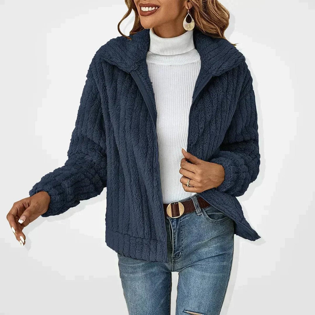 navy fluffy zip-up teddy jacket with wide lapel and long sleeves