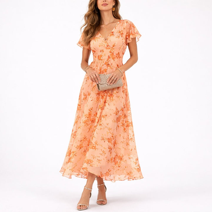 peach floral chiffon maxi dress with flutter sleeves and V-neckline