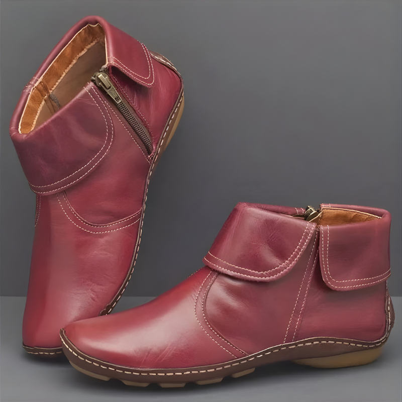 Burgundy leather ankle boots with fold-over cuff and side zipper detail