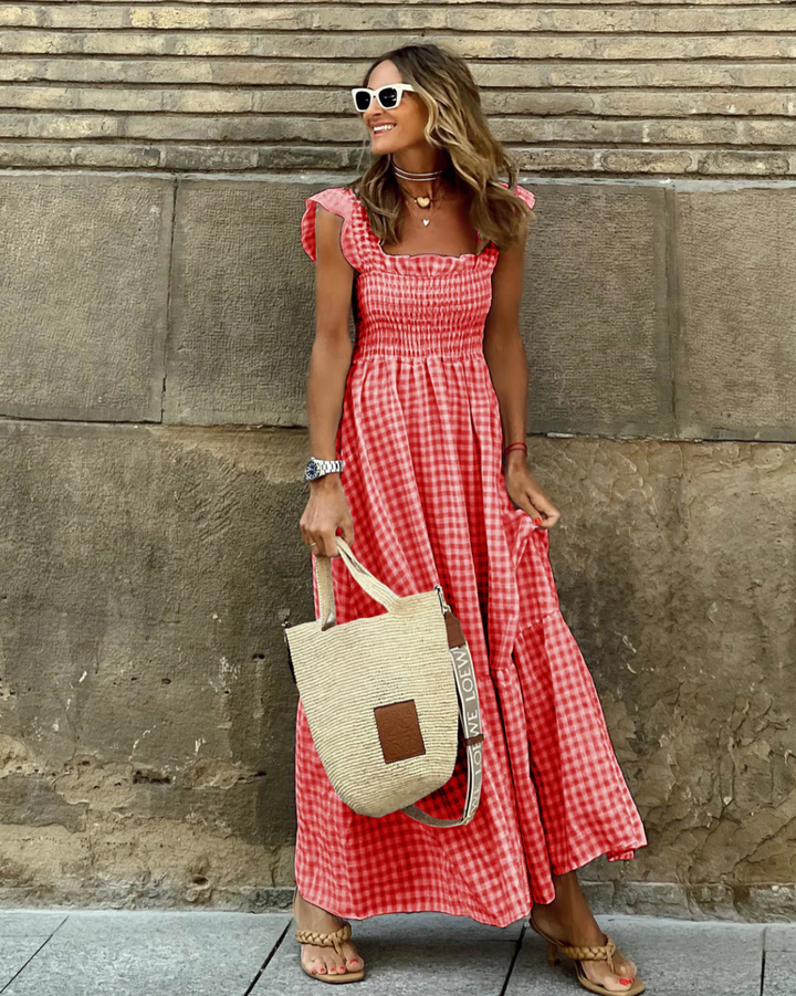 red gingham smocked square neck maxi dress with ruffle straps and braided sandals