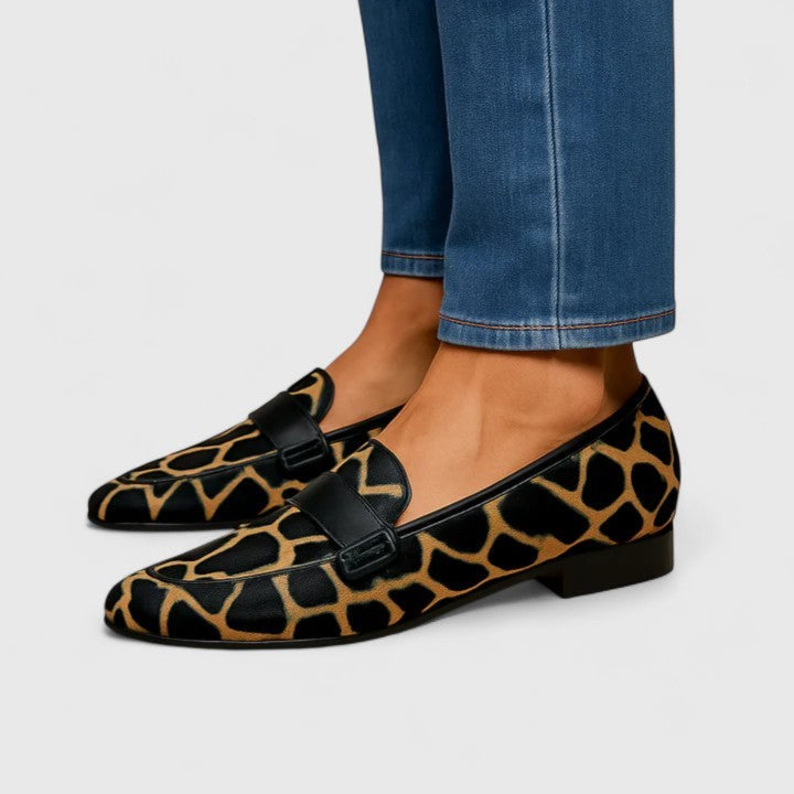 Giraffe-print calf hair loafers with black leather trim and low heel