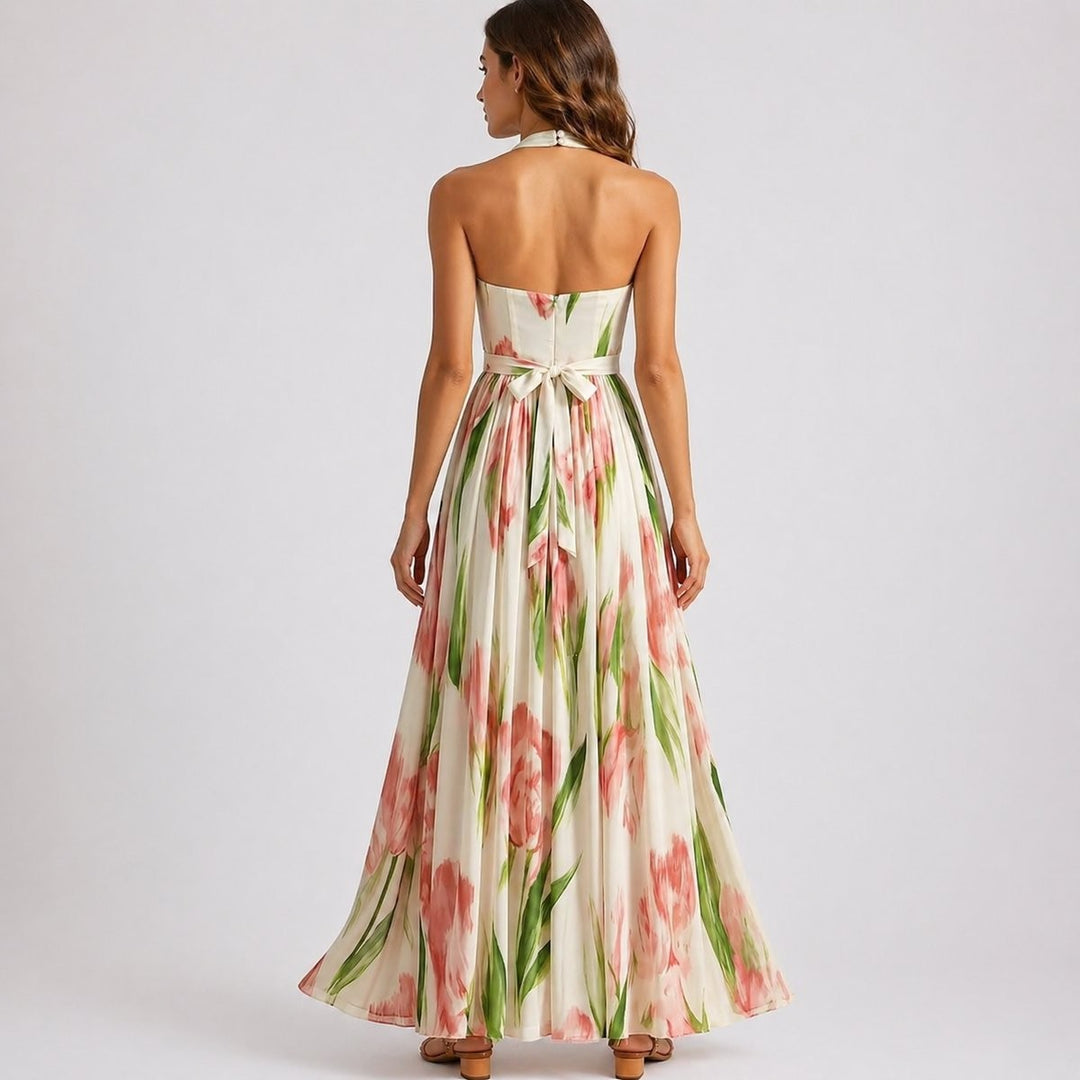Backless halter maxi dress showing tie waist and floral print