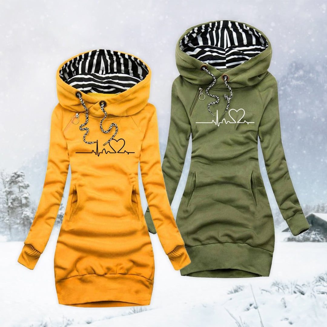 Yellow and green heartbeat print hoodie dresses shown side by side outdoors