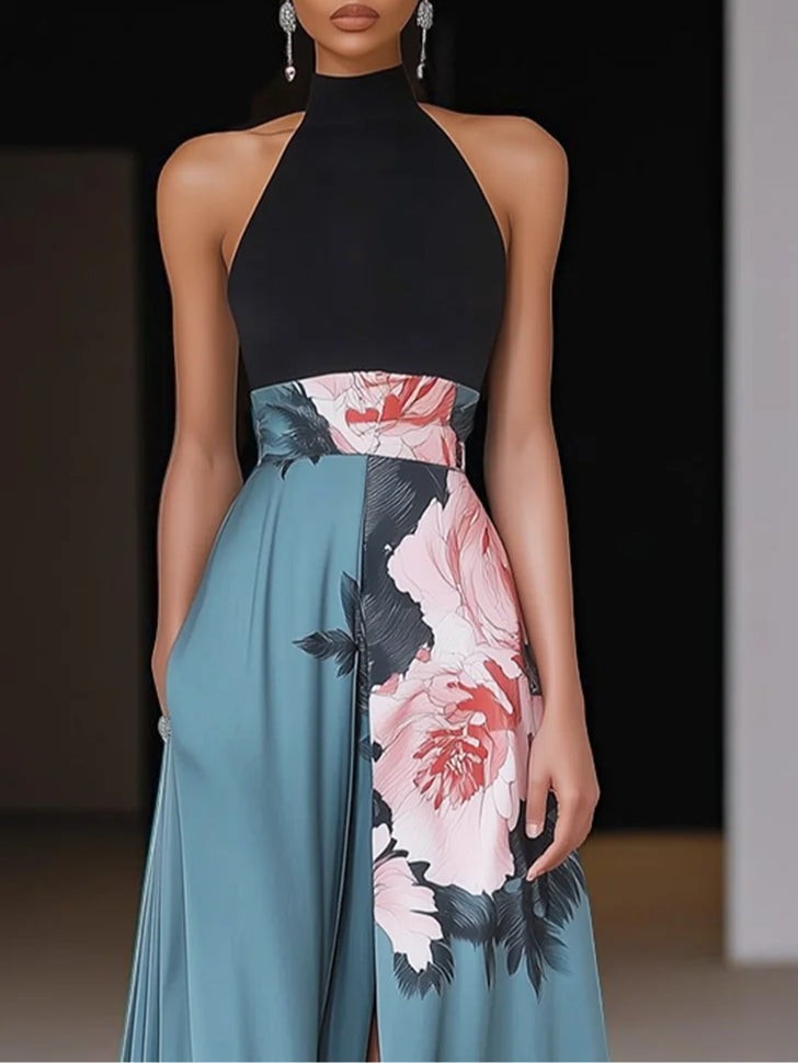 Close-up of halter-neck maxi dress showing floral waistband and high slit detail