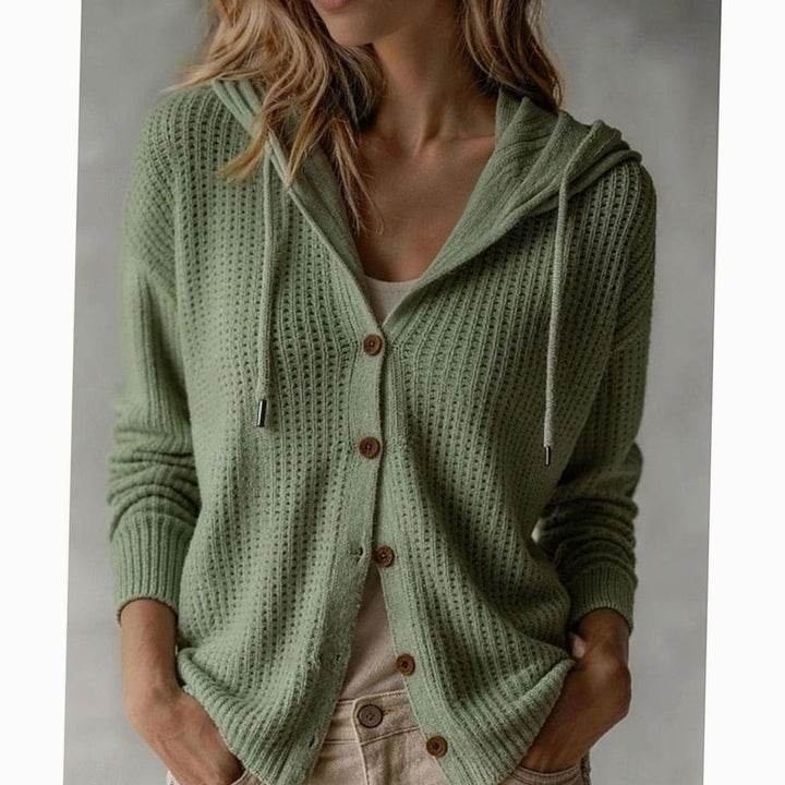 Sage green hooded cardigan featuring waffle knit and wooden buttons