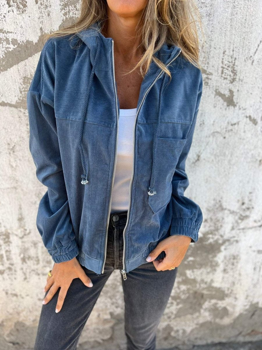 Blue corduroy hooded zip-up jacket with drawstring pockets, oversized fit