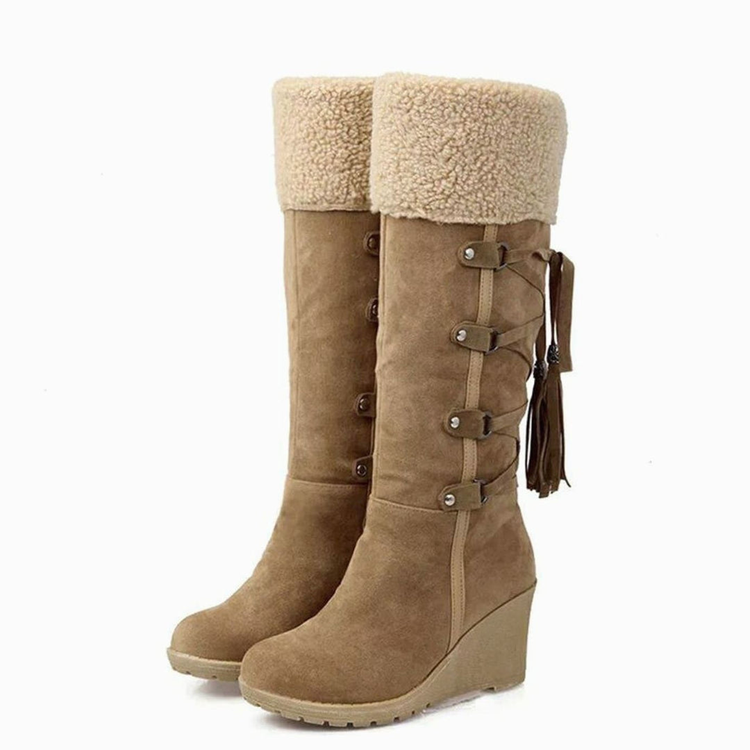 Camel suede wedge boots with shearling cuff and tassel lace-up detail