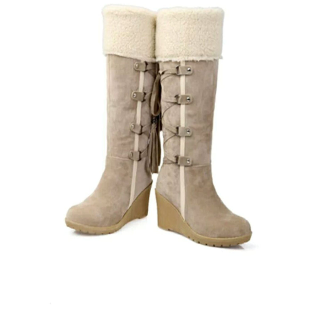 Beige knee-high wedge winter boots featuring faux-fur cuff and side tassel