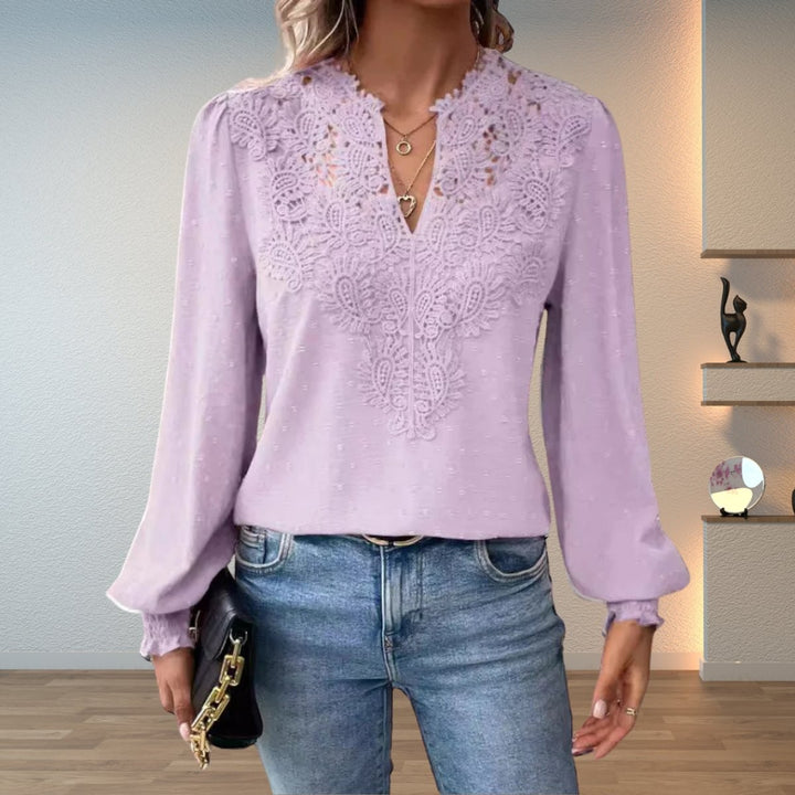 Lavender lace-bodice V-neck blouse with smocked cuffs, close-up front view