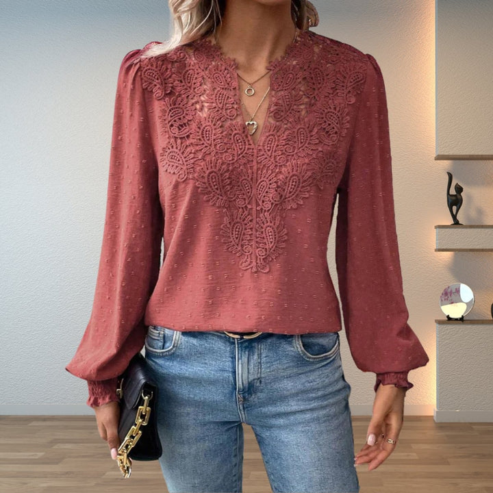Dusty rose lace-trim V-neck blouse with long sleeves styled with jeans