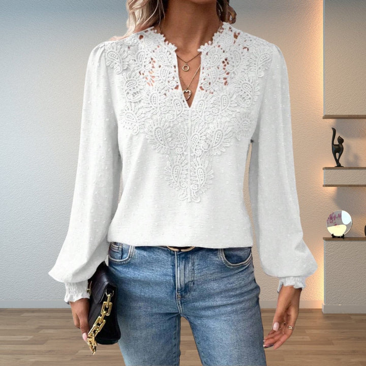 White crochet lace V-neck blouse with textured fabric and long sleeves