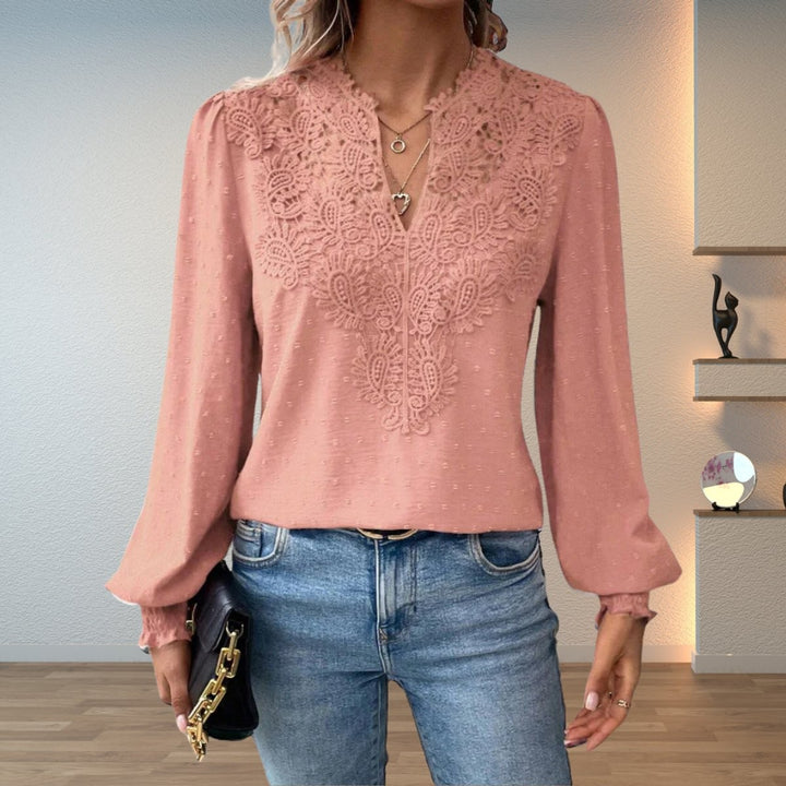 Blush pink lace-bodice blouse with V-neck and smocked cuff sleeves