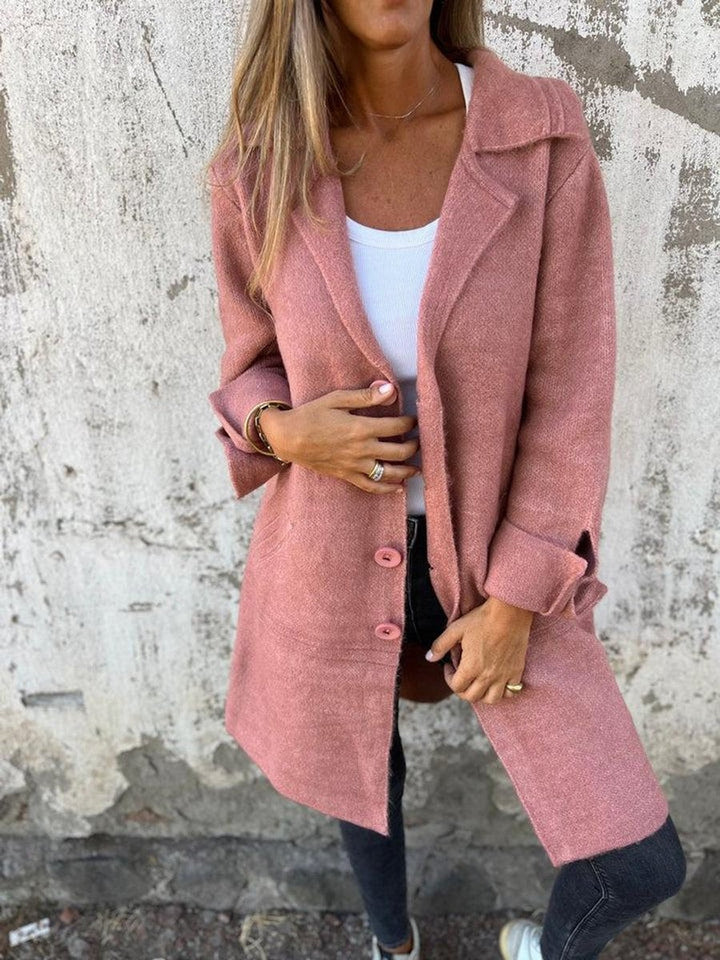 blush pink relaxed-fit coat featuring notched lapel and front buttons