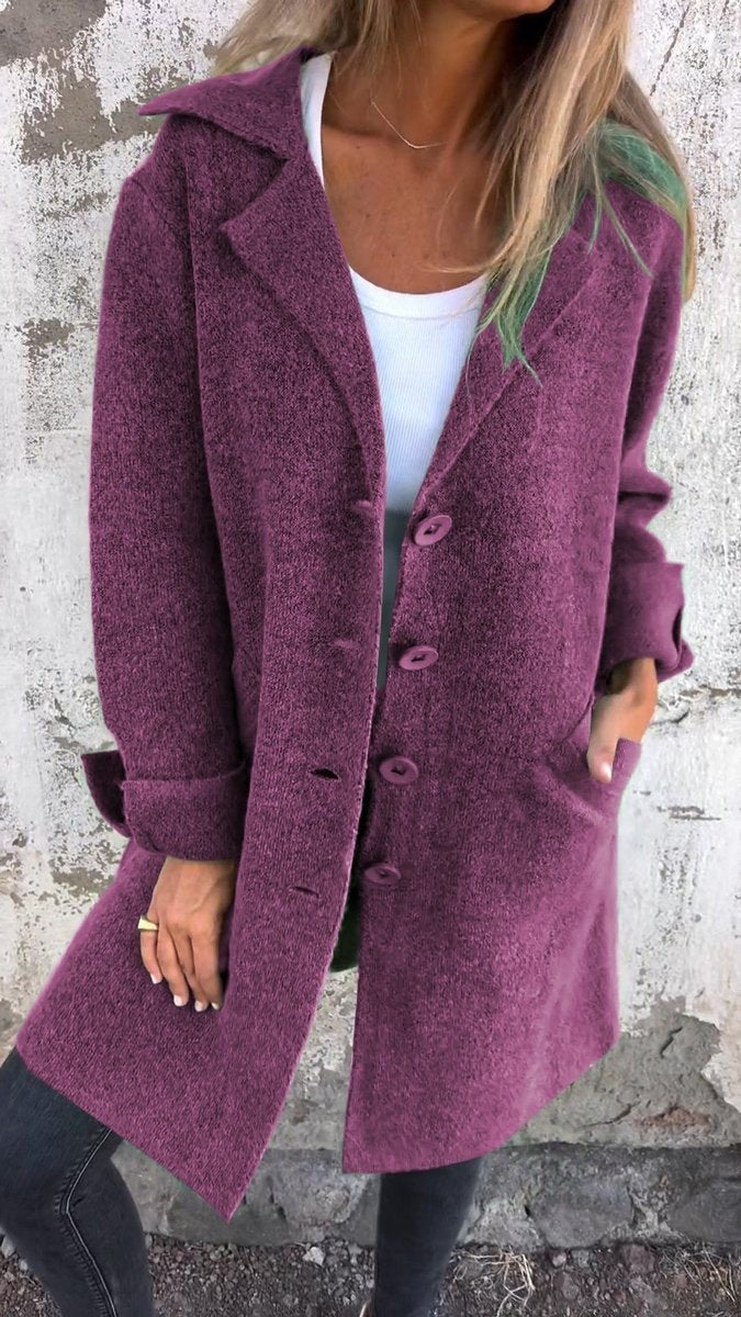plum longline button-up coat with lapel collar and cuffed sleeves