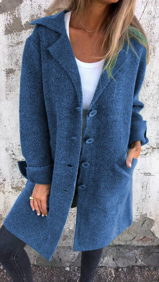 denim blue longline coat featuring lapel collar and cuffed sleeves