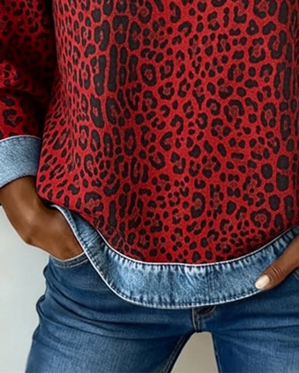 Red leopard print sweater hem with denim contrast trim and cuff detail