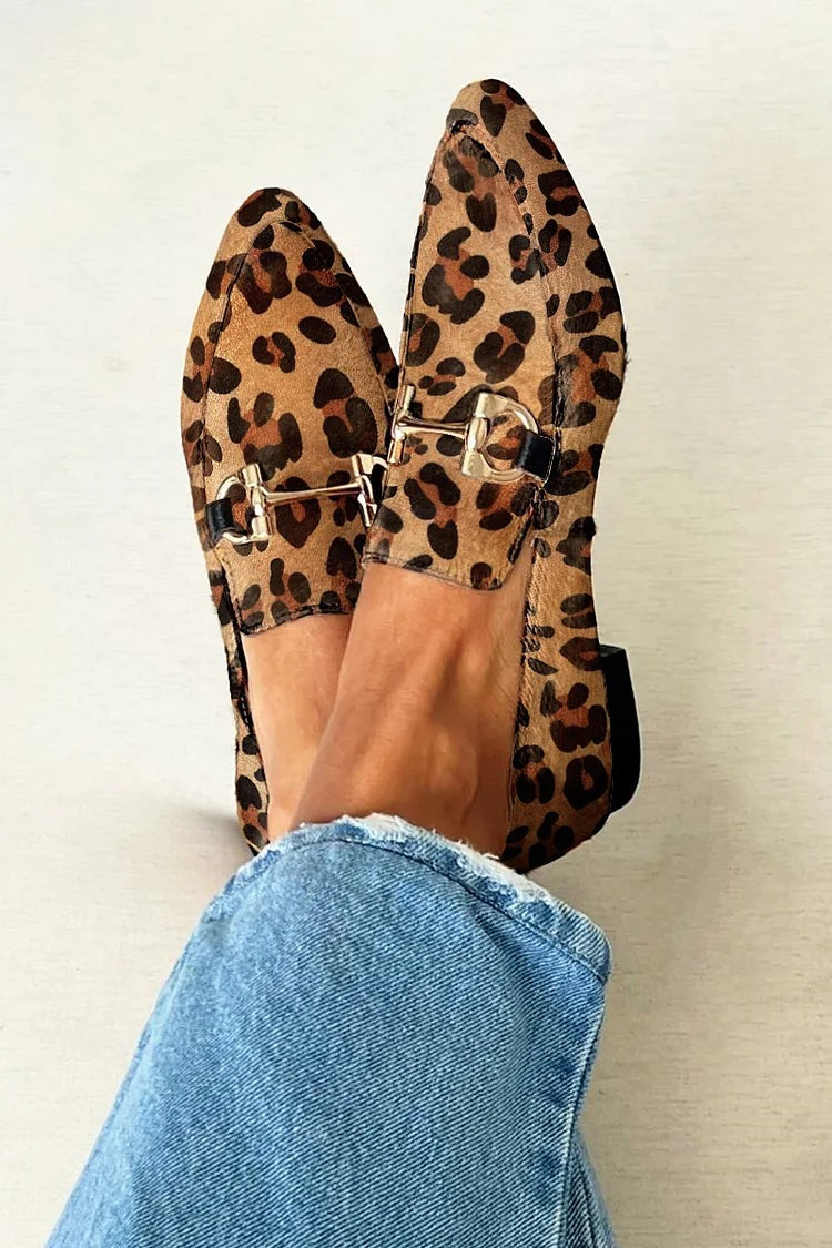 Leopard print bit loafers with gold buckle detail, worn with cropped jeans