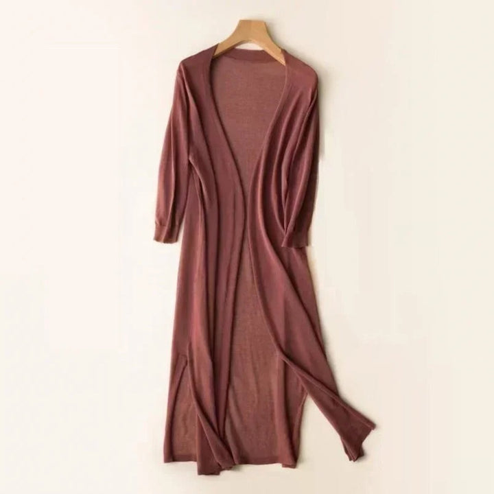 rust red long knit cardigan with three-quarter sleeves and side slits