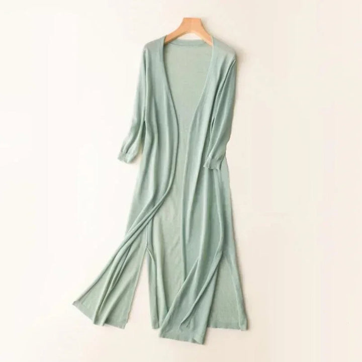 mint green lightweight open-front knit cardigan on wooden hanger