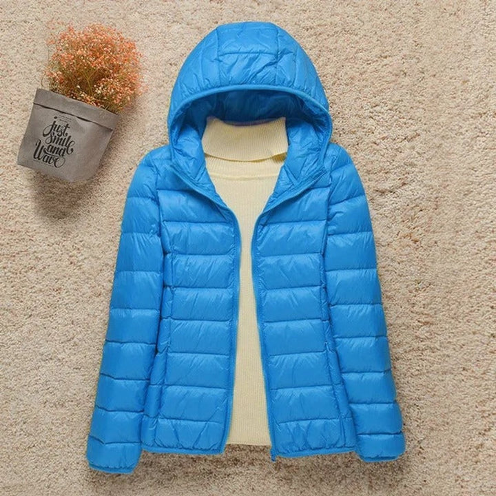 Bright blue hooded quilted puffer jacket with lightweight down fill