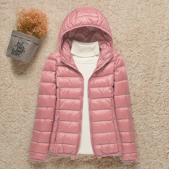 Dusty pink hooded lightweight puffer jacket with zip closure