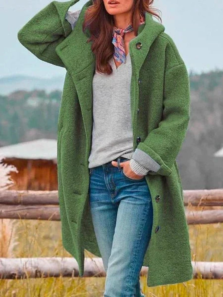 olive green hooded fleece coat with button front, styled over gray top