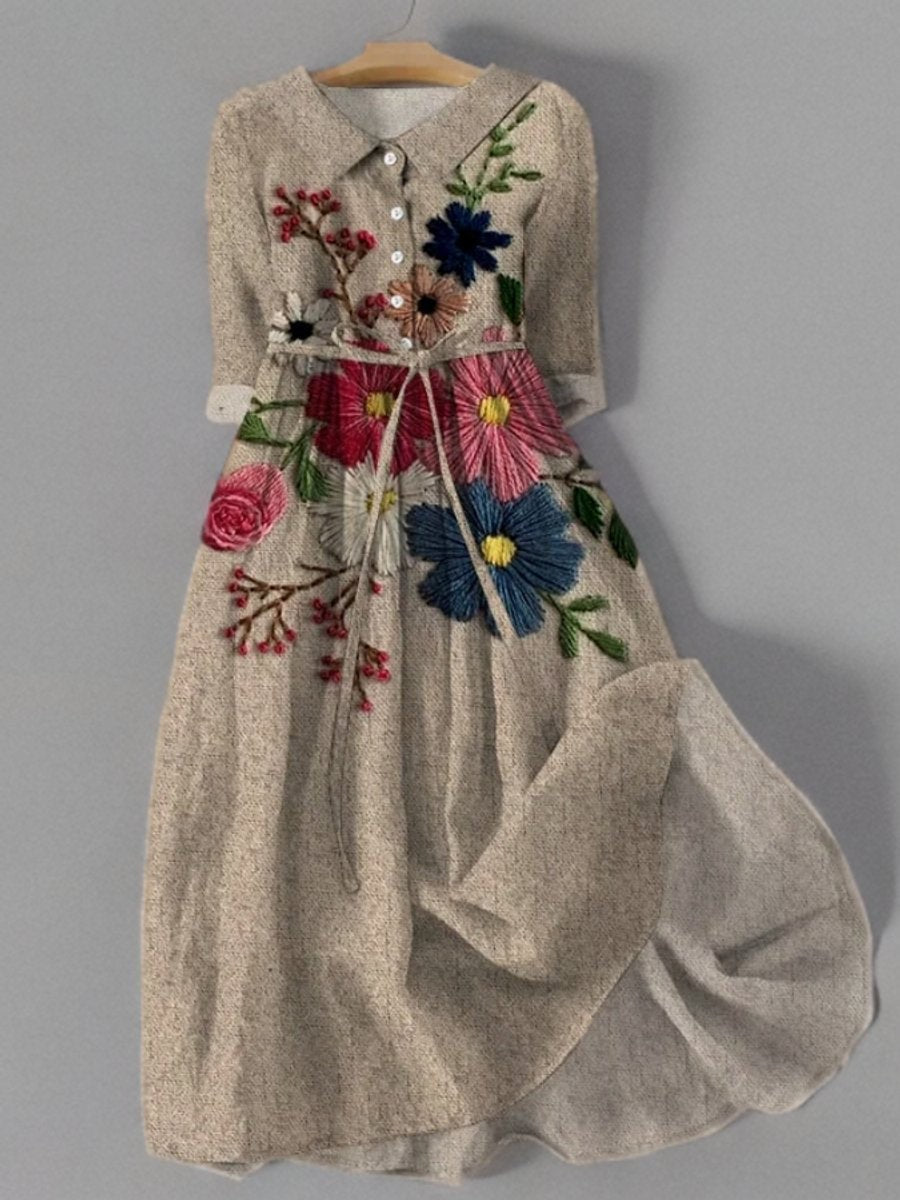 Beige linen midi dress with colorful floral embroidery and tie waist belt
