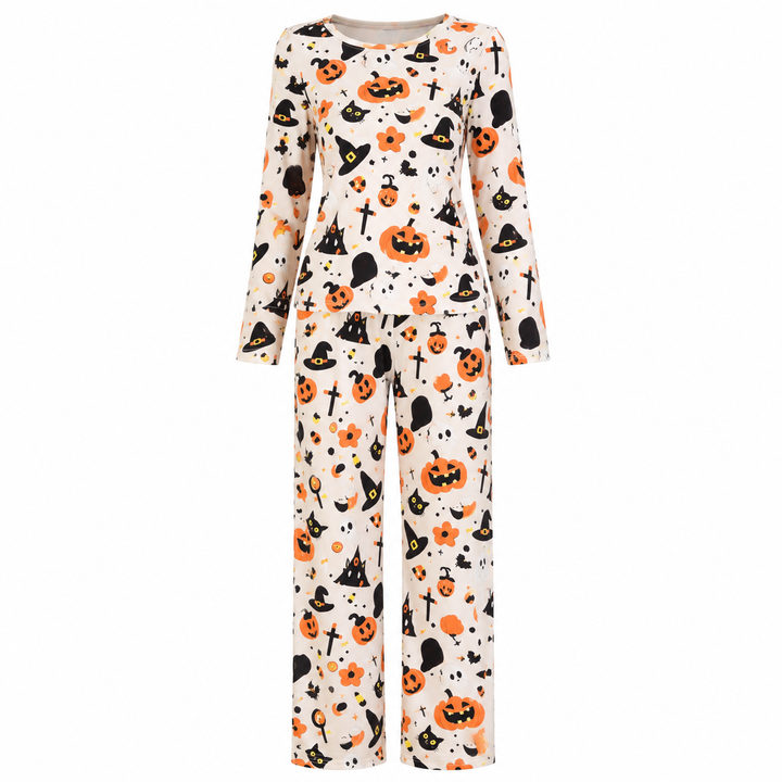 Cream two-piece pajama set featuring orange pumpkins and witch hat print, flat lay