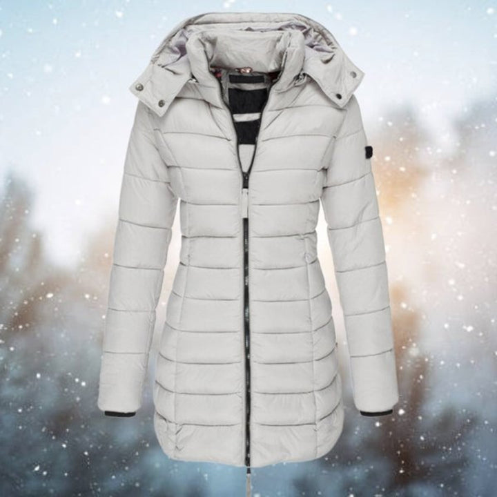 Light gray hooded puffer jacket with quilted texture and long cut
