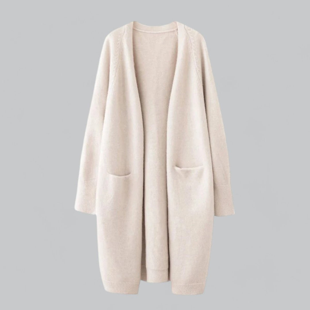 Beige oversized knit cardigan with long sleeves and front pockets