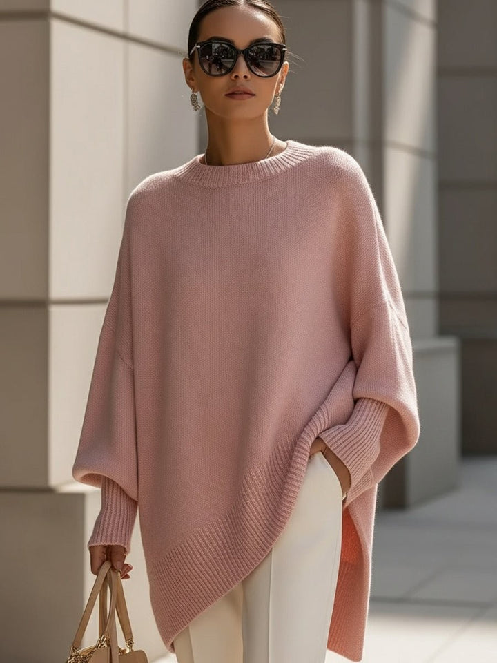 Blush pink oversized knit sweater with dolman sleeves and ribbed trim