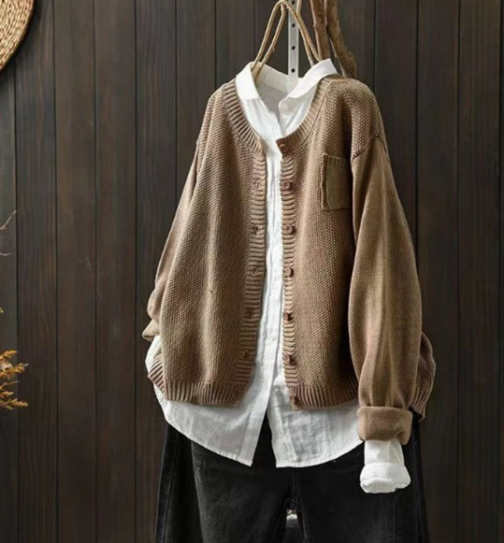 Camel brown knit cardigan featuring ribbed edges and relaxed drop shoulders