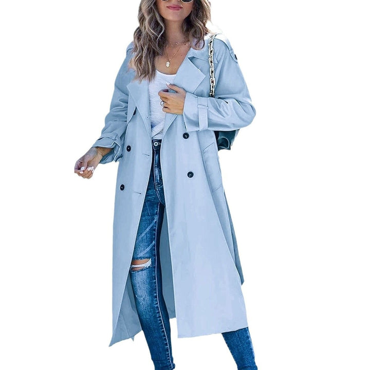 light blue oversized trench coat with belted cuffs and buttons