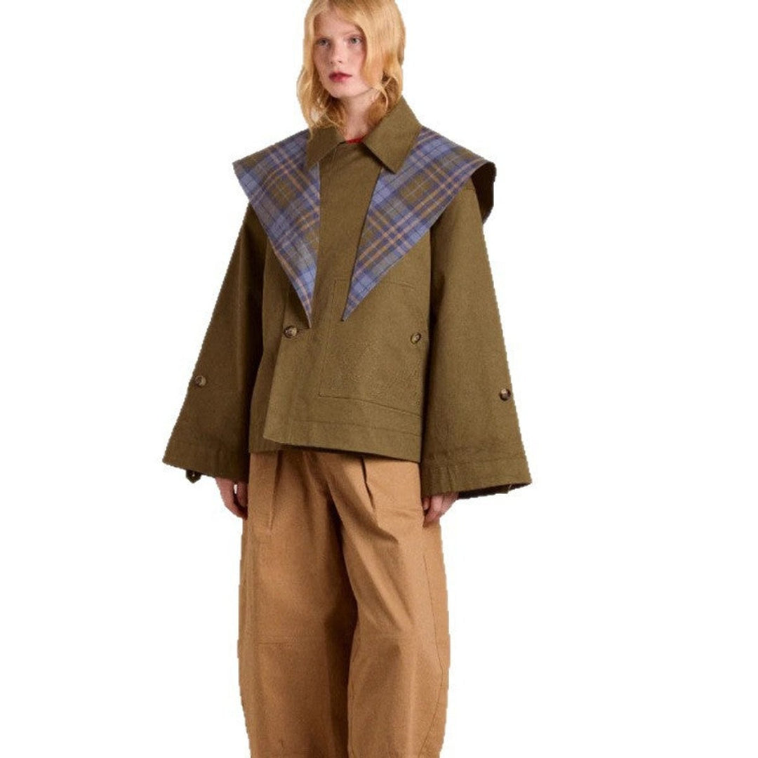side view of olive plaid-lined trench coat with wide bell sleeves