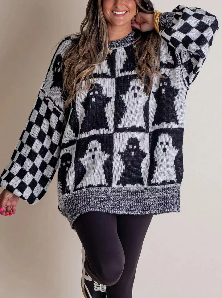 black and white checkered sweater with ghost graphic knit design