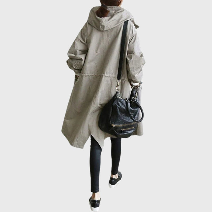 Taupe oversized trench coat back view with crossbody bag