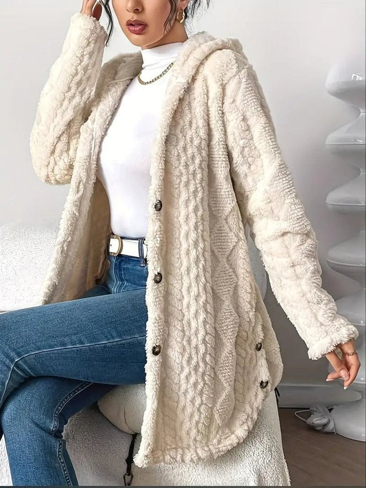 ivory plush fleece hooded cardigan styled with white belt and blue jeans