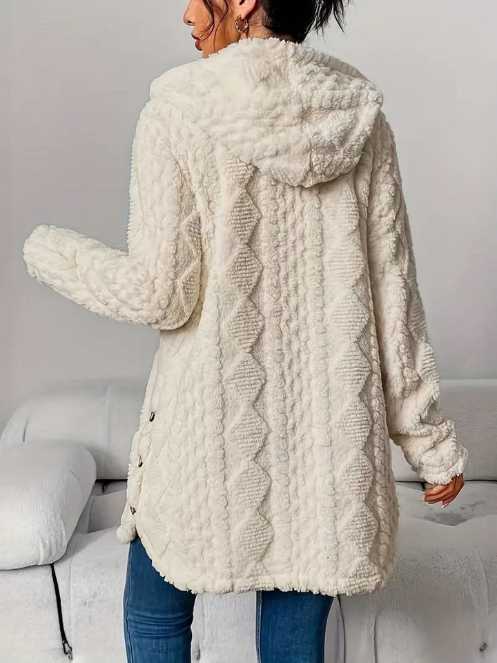 Ivory plush hooded cardigan back view highlighting cable knit texture