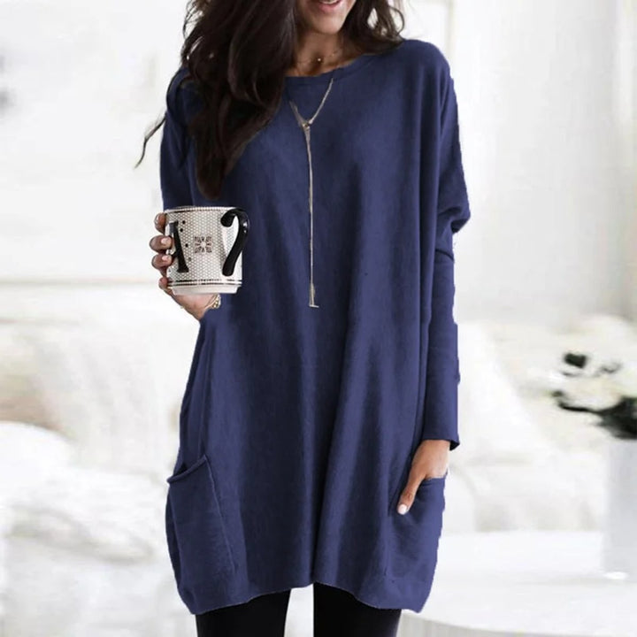 Navy blue long-sleeve tunic top featuring a loose oversized silhouette